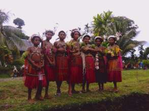 Young girls, Kavailo village in traditional attire