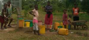 Collecting drinking water in Mnukwa