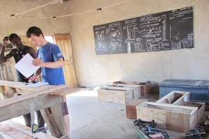 Carpenters Wilson and Dan in the Workshop