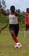 Girl playing football