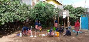 Grade 3 work on projects in the playground