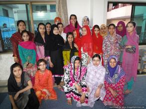 Dr. Chaudhry with Girls at Saba Homes