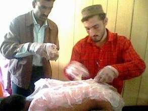 CDRS EMTs Dressing Boy's Burns