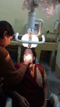A lady undergoing dental treatment