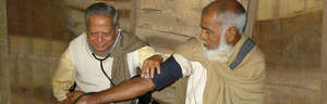A doctor treats a patient at an RHCF centre