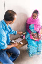 Noori being advised how to take the medicines