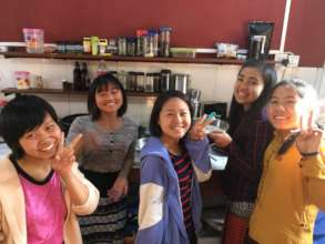 Interns having a fun time in the kitchen