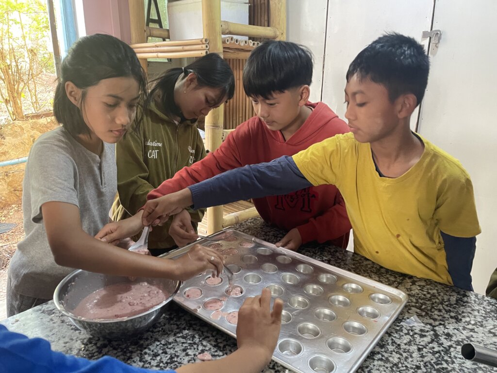 English class students trying their hand at baking