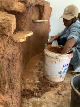 Interns learning to build and design with mud!