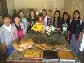 Some of the interns and the new bakery items