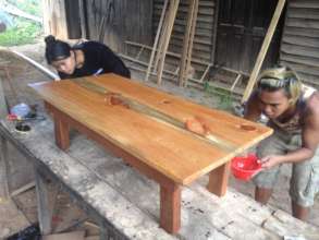 Finishing touch new tables in our woodworking area
