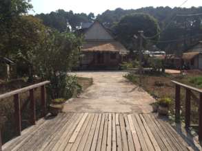 Wooden bridge entrance into new Sprouting Seeds