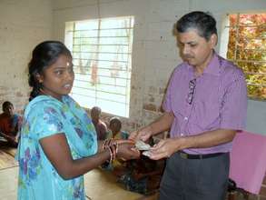 Mr.Bala from Singapore distributes scholarships