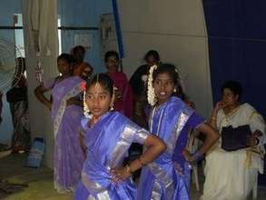 Adolescent girls  dance in International Women's D