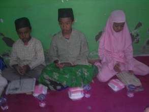 Learning together to read Al Quran