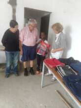 Distribution of school bags by the partner