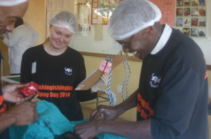 Megan assisting Dr. Lufungulo