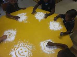 Grade R learners experimenting with textures