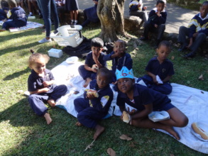 Pre-schoolers enjoying their Market Day treats