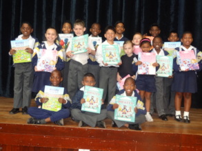Reading Bee participants with their book prizes