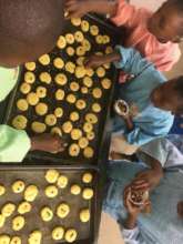 Pre-school children decorating biscuits
