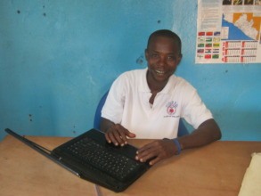 Team leader, John Kamma, with his laptop