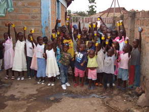 Children at the center being fed once a week