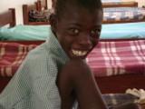 Samsonm Taboswa dressed in his school uniform