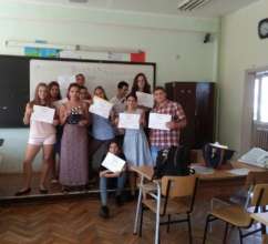 Students with certificates for accomplishments