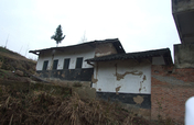 Provide a new school building for mountain village