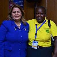 Gladys (right) at a KEWOPA FGM conference