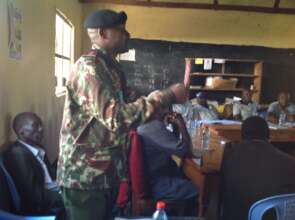 A law enforcer urging the men to be Anti-FGM