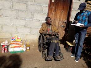 Pastor Bheki with one of the beneficiaries