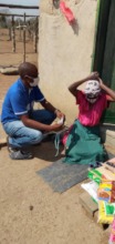 Gogo rejoicing that she was able to receive a food