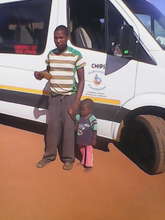 Phinda and his dad with the CHIPS van