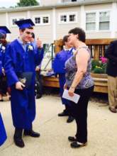 Aidan the graduate and Anna the AP French Teacher