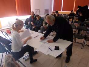 Signing contracts with beneficiaries in Obrenovac
