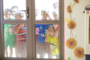 K-Ing kindergarteners wait for the doors to open.
