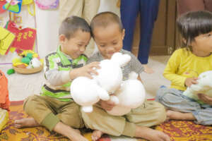 Kindergarteners enjoying gifts from PeaceTrees