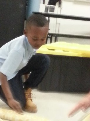 Tyree pets the python