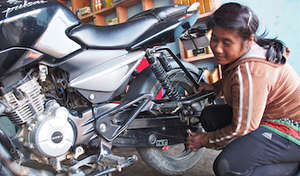 Kamala's loan funded her motorcycle repair shop
