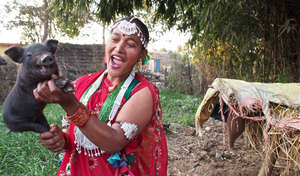 Sita with a piglet