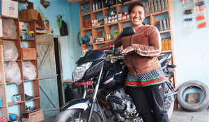 Kamala fixes motorcycles in her own repair shop