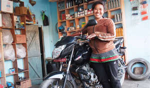 Kamala fixes motorcycles in her own repair shop
