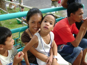 A Cerebral Palsy Camper w/ Volunteer Ate