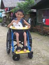 Provision of supportive seating wheelchair to a CP