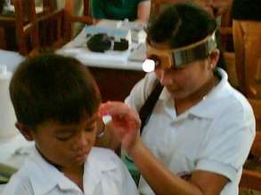 Ear Screenings to Grade School Children