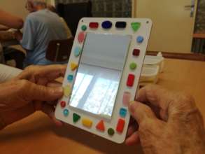 Mosaic decorated hand mirror