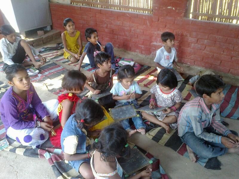 Provide non formal education to children in slums