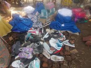 Gently used shoes & new socks await new owners